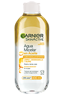 Botella de agua micelar bifásica Garnier Skin Active, tapa rosa.